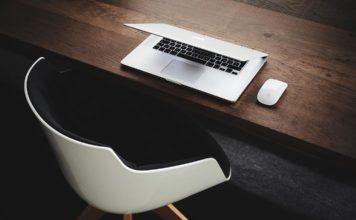 Kim Kardashian Shows Off Deep Cleavage In Plunging Top & Mini